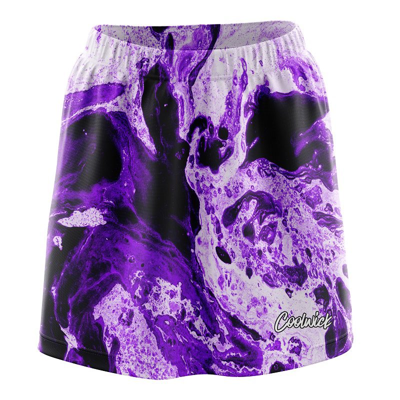 How long is this skort?  Does it sit at the natural waist, above it or below it?  What does the back look like?